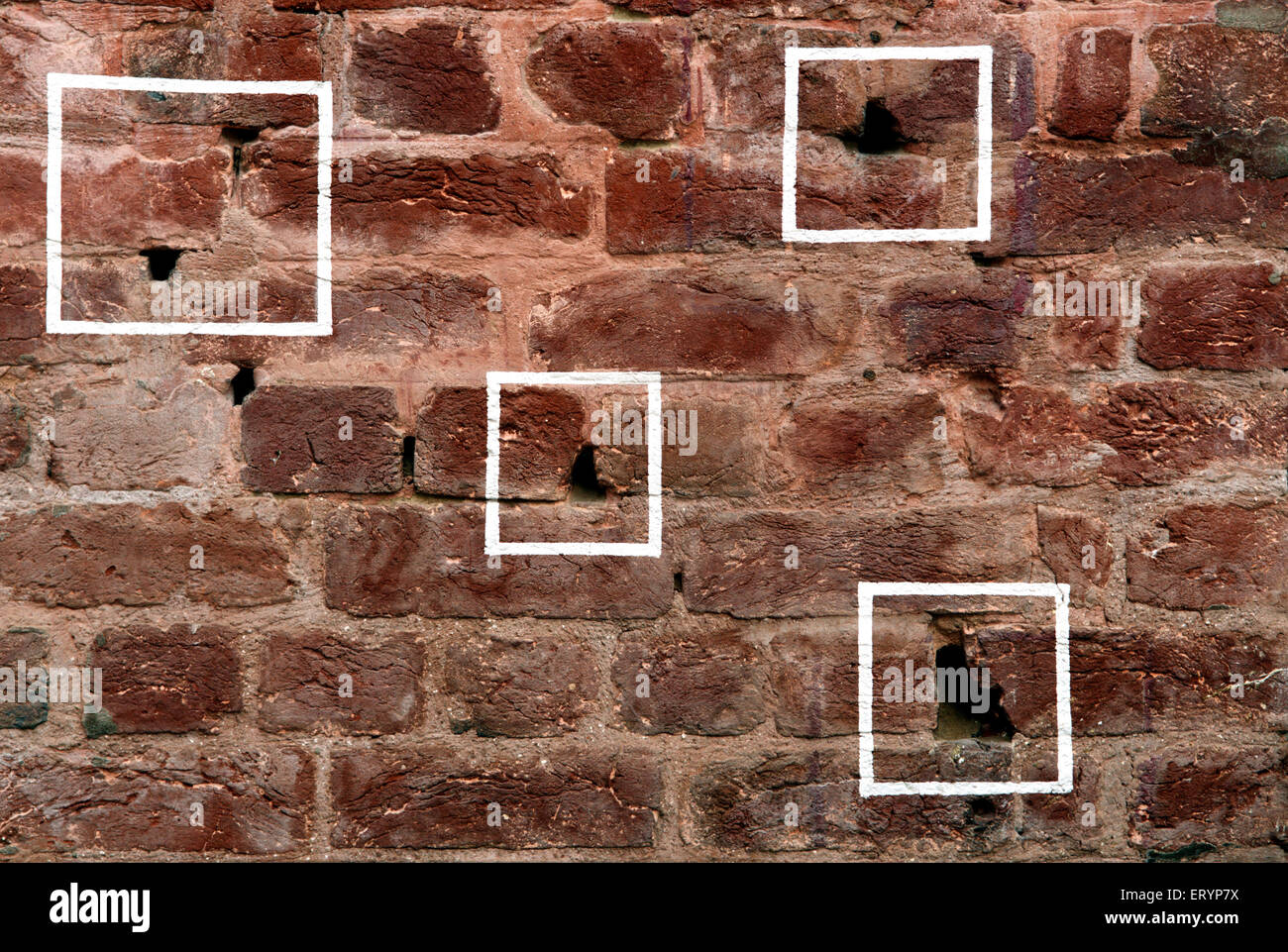 View the bullet-marked wall