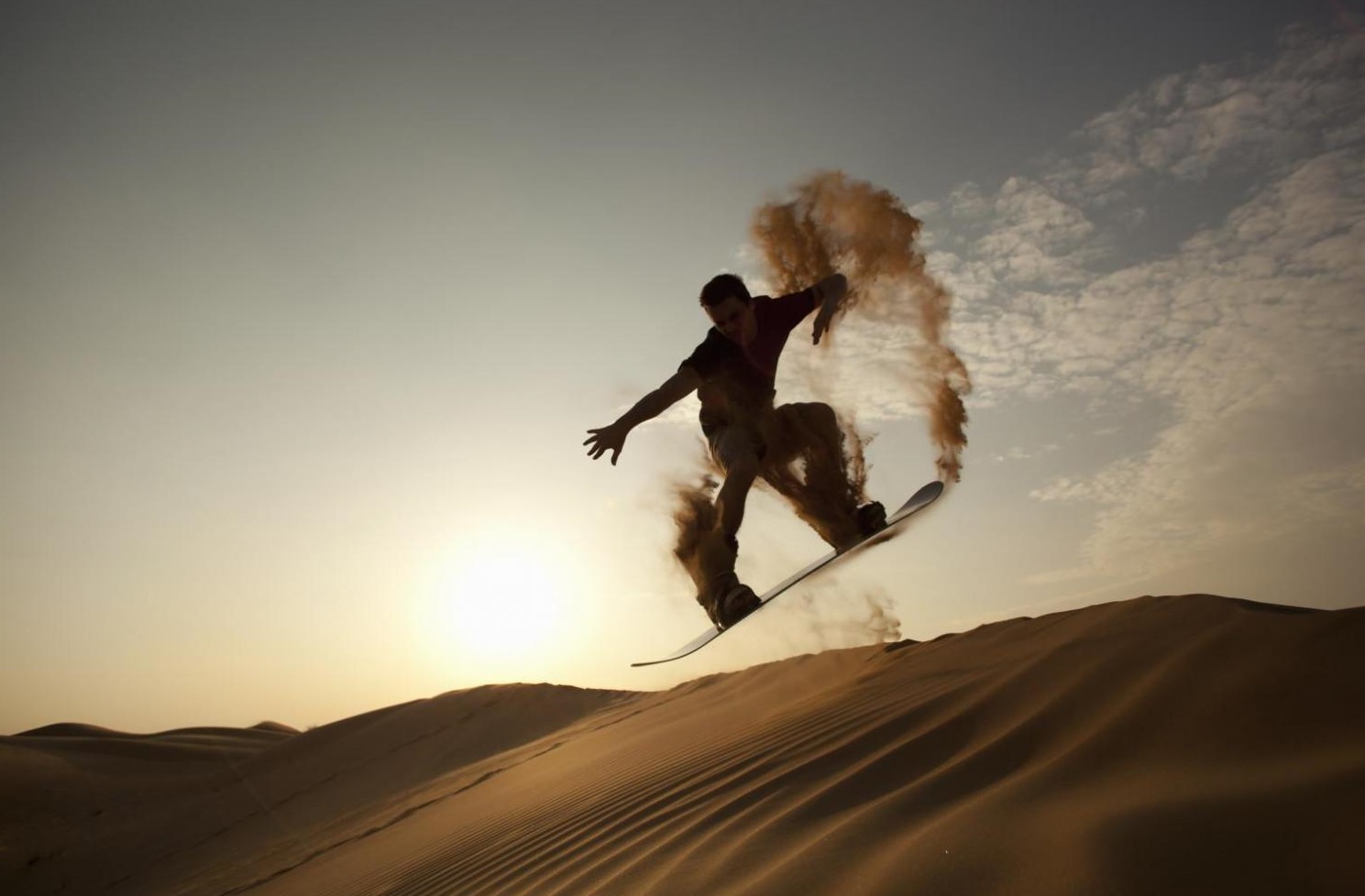 Sandboarding on the Slipface