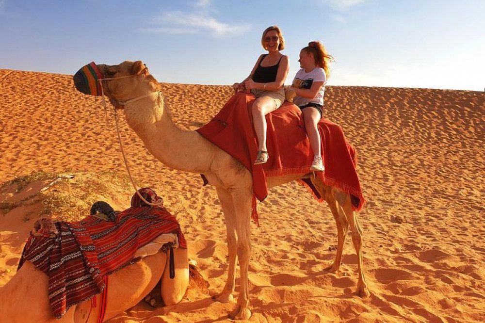 Dubai Half Day Desert Safari Camels Quad Bike & Refreshments