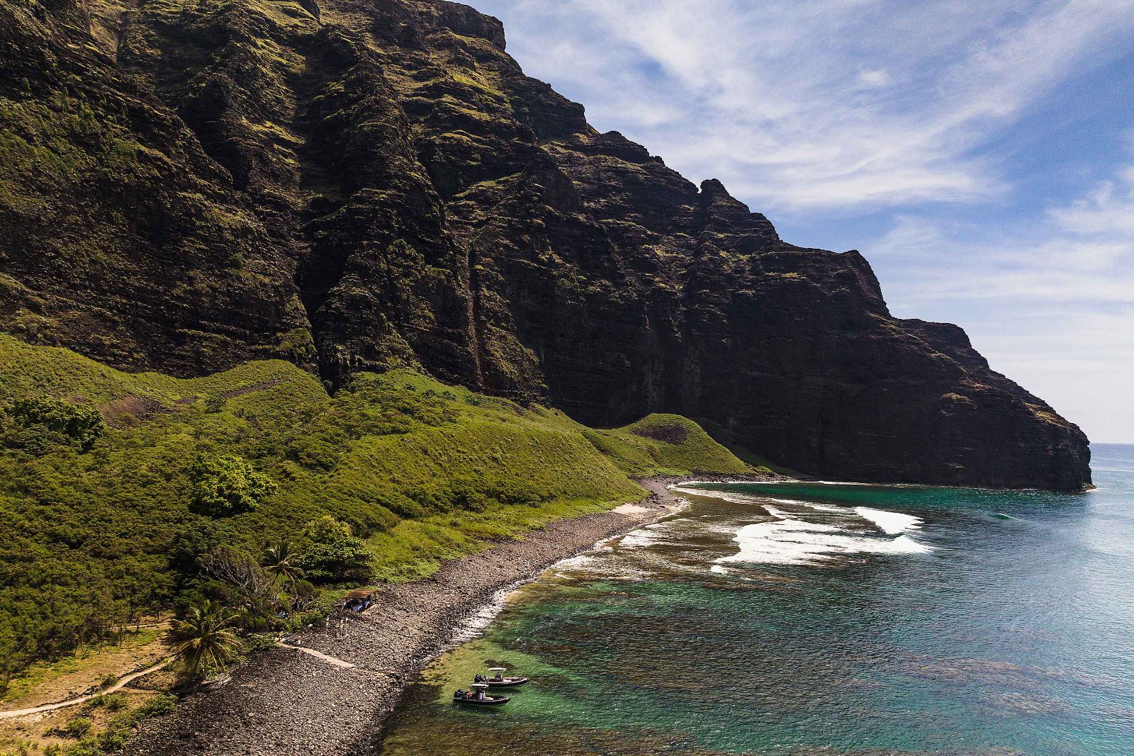 Known as the Valley of the Lost King, this site is accessible only by sea and features a massive natural stone arch.