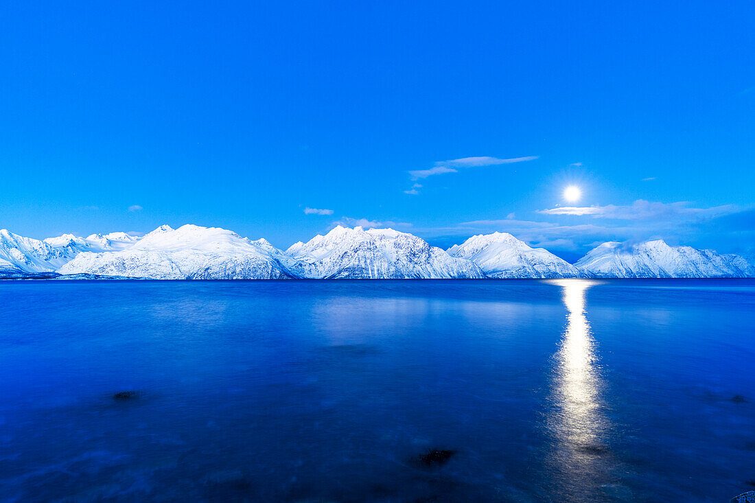Riding the Lyngen Alps Snowmobile Tour